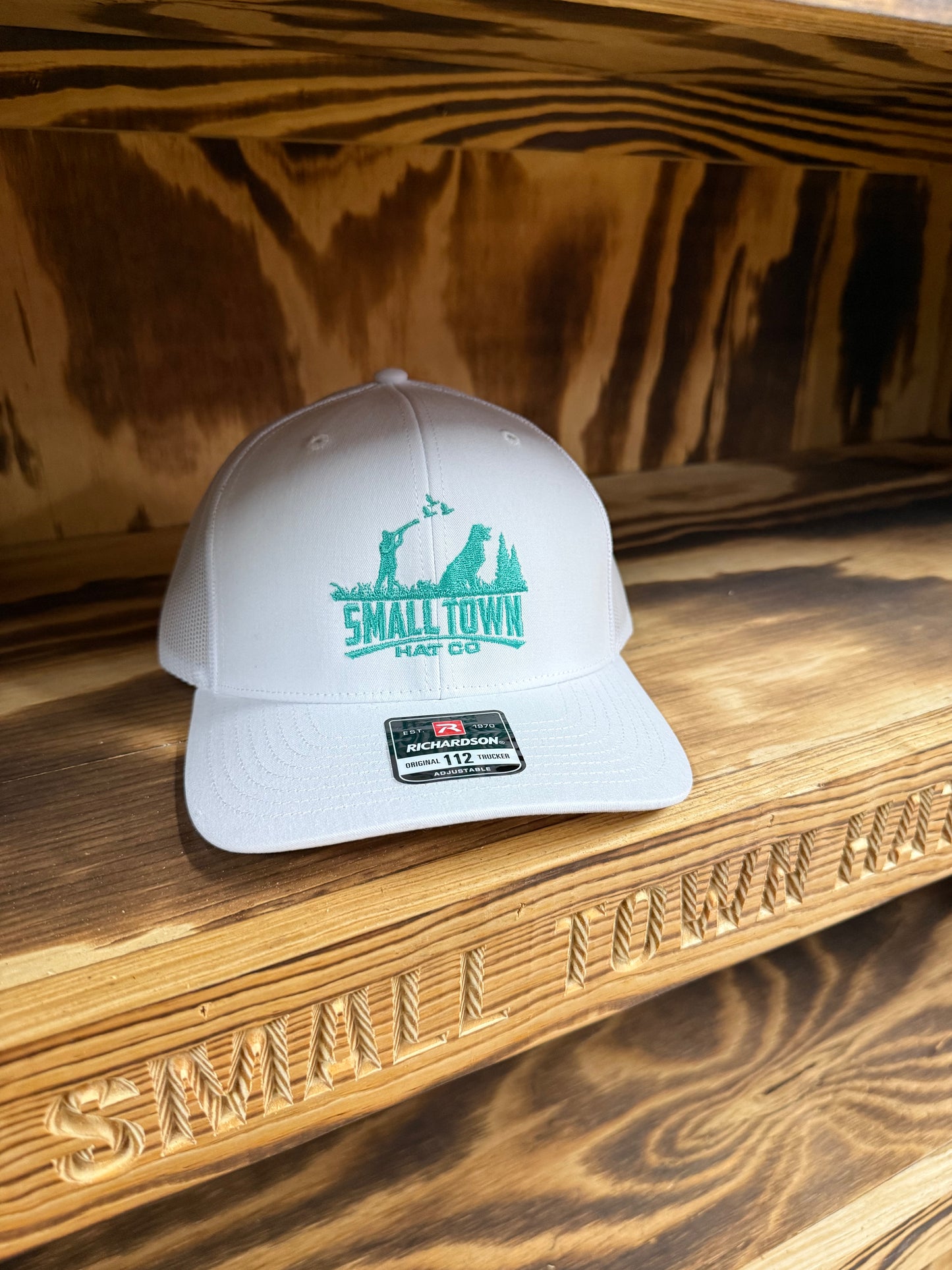 All white 112 teal embroidery